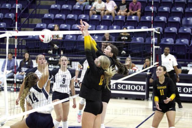 Shawnee’s Chrishelle Milum (#14) tries to tip the ball over the net, but is blocked by Tecumseh’s Kenadee Mason (#12) and Rylee Williams during the Sept. 17 match at Shawnee. Also shown are Shawnee’s Molly Megehee and Josie Megehee and Tecumseh’s Jalee Meyers. The Lady Savages beat the Lady Wolves, 3-0: 25-21, 25-18, and 25-22. The 2024 Shawnee Invitational was also held over the weekend at OBU, and they hosted six other volleyball teams: OKC Storm, Glenpool, PCN, Guthrie, Cascia Hall and NW Classen.