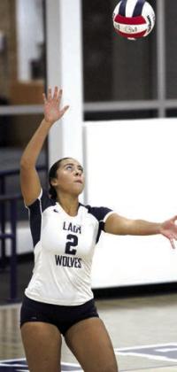 Shawnee’s Kalieo Citizen serves during a home match against Tecumseh High School on Sept. 17. Countywide &amp; Sun/Natasha Dunagan