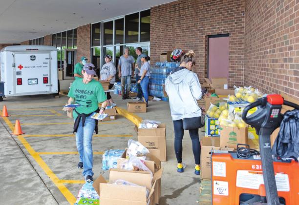American Red Cross volunteers unload supplies for the relief effort outside the Enoch Kelly Haney Center on the SSC campus on May 5. Photo provided by Seminole State College