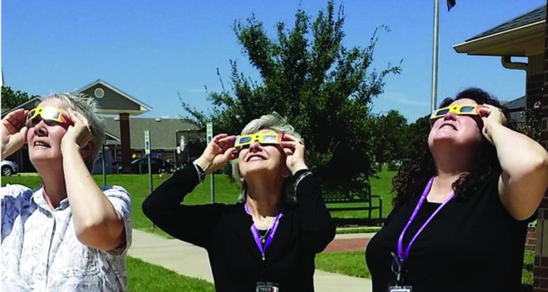Blanchard Public Library staff view the August 2017 eclipse. Photo provided by Pioneer Library System