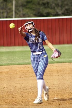 Bethel sophomore Kinley Anthony puts a twist on her pitch during the slow pitch game at McLoud on April 14. The Lady Redskins beat the Lady Wildcats, 8-7, in overtime. Natasha Dunagan, Countywide &amp; Sun