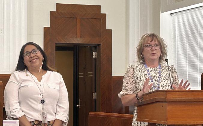 Citizen Potawatomi Nation House of Hope Director Tia any Barrett (pictured right) tells the attendees of the Domestic Violence Awareness and Awards Ceremony why she nominated Melody Ybarra (pictured left) as the 2023 Pottawatomie County Victim Advocate of the Year. Countywide &amp;amp; Sun/Suzie Campbell