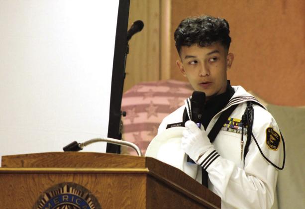 US Naval Sea Cadets Corp. PO2 Zackary Hastings gives the 'Flag Response' during the Flag Day Ceremony. The Patriot Division Sea Cadets also presented the colors, performed the flag folding ceremony and helped to retire 400 flags at the event.