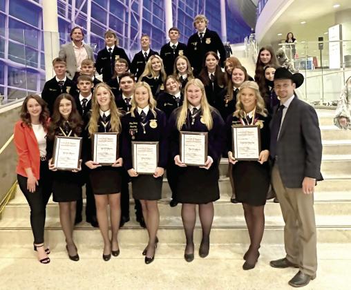 On May 2-3, 24 Tecumseh FFA members attended the Oklahoma State FFA Convention in Tulsa, and five received their State FFA Degrees, according to the Tecumseh FFA Facebook page. Posing with their fellow members and Advisors Mara Carman, far left, and Dodge Nichols, far right, they are Jocelyn Phelps, Marli Williams, Chloe Kelsey, Piper Goodson and Katelyn Fleming. Photo provided.