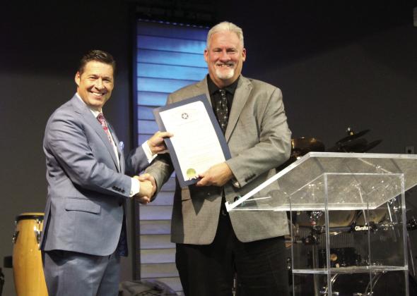 Oklahoma Senator Shane Jett presents a Senate Citation to Pastor Don Jonker in honor of the 75th anniversary of Tecumseh First Assembly of God. Jett and Jonker spoke at the event on Nov. 9. There was also a slide show, a musical performance by Worship Leader/Assistant Pastor Matt Rogers, and a sermon from Assemblies of God Presbyter Jeroyme Jackson from Stroud. Countywide &amp; Sun/Natasha Dunagan