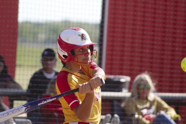 Dale’s Catelyn Edwards keeps her eye on the ball during the April 22 home game with Class 6A Mustang. In Class 4A, the Lady Pirates slow pitch team lost, 8-17, making their record 29-6. They played in Regionals on Apr 23 and beat Hinton 11-6 and Coalgate 14-3. Countywide &amp; Sun/ Natasha Dunagan