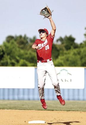 North Rock Creek’s Hunter Bertram leaps for the ball in action June 11 against Bethel in the summer league game.