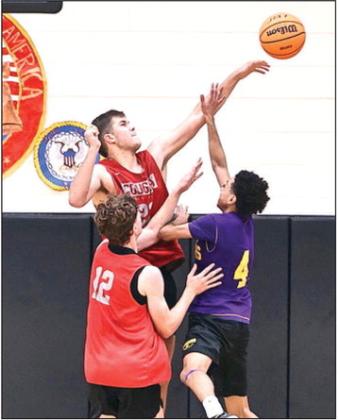 NRC's Jace Plumb blocks the Anadarko players shot in the scrimmage on Nov. 15. The varsity went 8-1-1, they will scrimmage Edmond North on Nov. 22. Jace Plumb blocks the Anadarko players shot. Photo courtesy of Gowin Photography