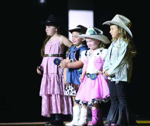 With the theme "Back to Our Roots, Where Beauty Runs Deep," the theme dress code was boots and cowboy hats. Modeling that look pictured right are the Tot Miss contestants, Charlee Dickey-Morrow, Harley Thompson, Karsin Glasgow and Everleigh Grochow during the Frontier Days Pageant on Sept. 21.
