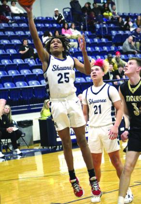 Shawnee’s Zylon Campbell gets a bucket in the first quarter of the game against Broken Arrow.