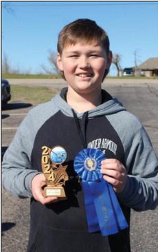 North Rock Creek 4-H member Tony Nelms won First Place in the youth category of the Oklahoma Fishing in the Schools 4-H Fishing Tournament on March 9 for catching a 17-inch, 2.17-pound buffalo carp. Countywide &amp; Sun/Natasha Dunagan