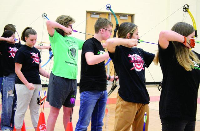 Three Earlsboro students (with target shirts) Jesslyn Williams, Briana Smith and Lilly Gentry compete in the NASP Tournament at NRC Middle School, Earlsboro brought 11 students to the tournament.