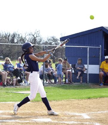 Shawnee's Alivia Grass takes her turn batting the ball during the March 27 game against Bethel. Jessica Jones, Tecumseh High School Intern, Countywide &amp; Sun