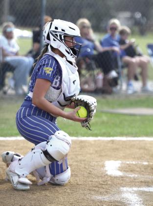 Bethel sophomore Frost Peltier pauses before throwing back to the pitcher in the third inning of the March 27 home game against Shawnee. The Wildcats won, 11-0. Natasha Dunagan, Countywide &amp; Sun