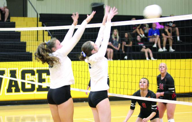 THS sophomores Aivah Dodgion and Kenda Whittington block the ball in the home match against North Rock Creek on Aug. 28. The Lady Savages lost, 2-3. Their scores for each game were 20-25, 25-21, 24-26, 25-14 and Natasha Dunagan, Countywide &amp;amp; Sun