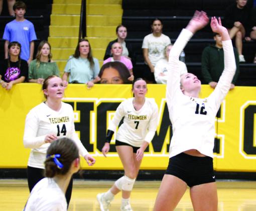 Natasha Dunagan, Countywide &amp;amp; Sun Right: THS senior Kennadee Mason waits to set the ball, as Channing Goodson (14) and Katie Johnson (7) look on, in the home match against NRC on Aug. 28.