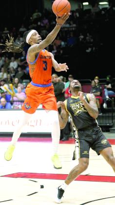 Potawatomi Fire Forward Ricky Artis II puts up a shot in their last regular season game on May 24. Artis contributed 25 points, according to potawatomifire.com. This was an afternoon game for 'Family Day.' Photo courtesy of Kent Bush