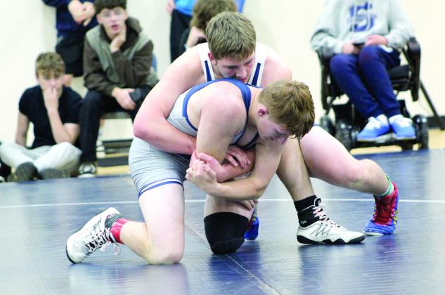 Pictured above, Shawnee’s Kasey Snider and Chicago Herron dual it out on the mat.