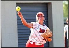 North Rock Creek’s Raynee Bass makes a throw to first for the out.