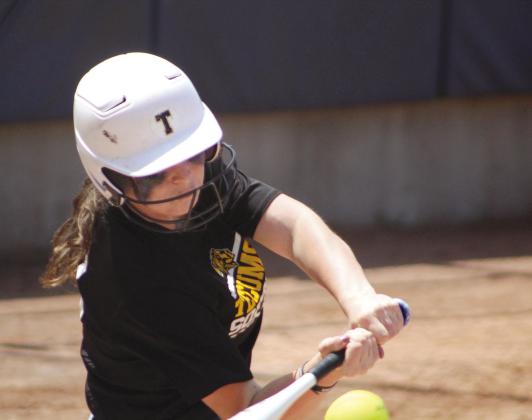 Katie Overstreet goes to bat in the State Slowpitch Quarterfinals on May 2. As a junior, Overstreet will be one of the five starters this year. File photo.