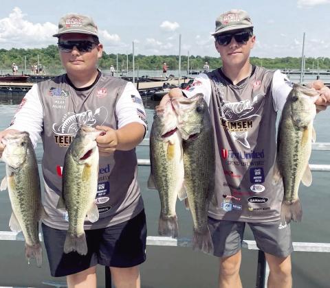 Tecumseh Savage Fishing Team of Alex Hurst, left, and Maddox Dickson pose with their catch from one of the days of fishing during the Oklahoma High School Fishing Championship tournament. The team placed 5th and will compete in the Angler Federation National Tournament at the end of this month. Photo provided