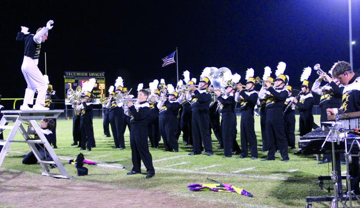 Tecumseh Drum Major Jesse Thoma leads the Savage Pride Marching Band in a medley of Beatles music during halftime of the Oct. 12 home football game. Countywide &amp; Sun/Natasha Dunagan