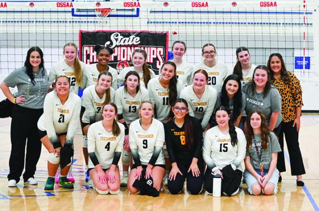 The Tecumseh High School Volleyball Team, along with Assistant Coach Natalie Whiteman, far le, and Head Coach Megan Laughlin, far right, pose aer playing in the OSSAA Class 4A Volleyball State Quarter als, for the st time in school history. _ey faced Community Christian School at Sapulpa High School on Oct. 17 and lost, 0-3. _e Lady Savages end their season with a record of 22-13. Photo courtesy of Kenetta Lisenbee.