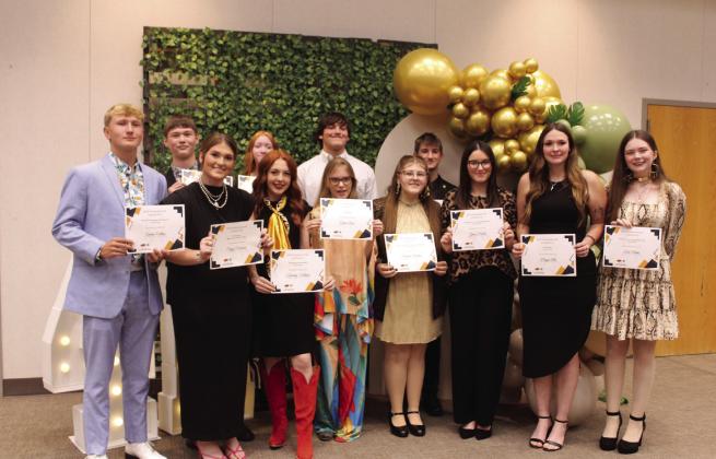 During the Pottawatomie County 4-H Awards Banquet on Oct. 27, members received awards for their record books. Shown, back row from left, are Tony Nelms, Addison McDaniel, Gabe Hobbs, Mason Luka, front row from left, Andrew Collins, Poppy Robinson, Kimberly Holland, Ember Luna, Madison Maddox, Grace Hobbs, Megyn Alls and Tori Nelms. Natasha Dunagan, Countywide &amp;amp; Sun