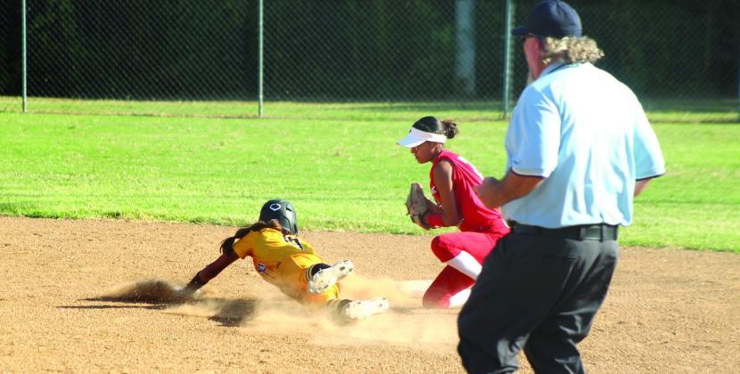 Earlsboro senior Molli Bustos guards second base as a Roff runner dive towards it during the first inning of the Aug. 13 home game. The Lady Wildcats lost 0-15. Photos by Natasha Dunagan, Countywide &amp; Sun