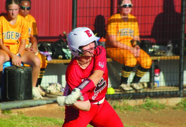 Peighton Worley makes contact while at bat.