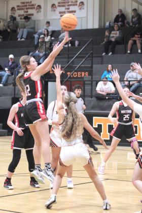 Macomb freshman Addy Beauchamp tries for a jump shot during the Dec. 9 game at Maud. The Lady Tigers won, 49-41.