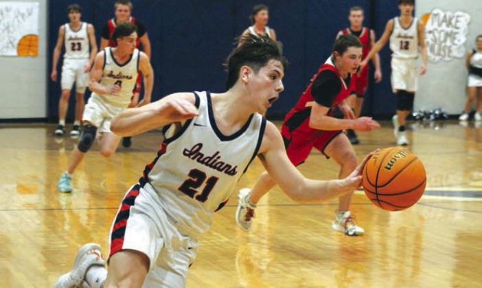 Asher’s Gunnar Lehman steals the ball and takes it to the hoop for two points during the Senior Night home game with Stratford, Feb. 2. The Indians lost 49-51, but they will go on to play in District 3 competition at 7:30 pm, Feb. 10, at home. Countywide &amp; Sun/Natasha Dunagan