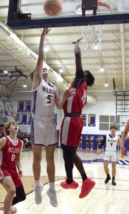 Zack Jennings drops in two against McLoud on Feb. 6th.