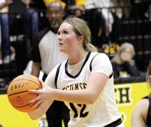 Tecumseh senior Sami Schweighardt aims for a foul shot during the first home game.