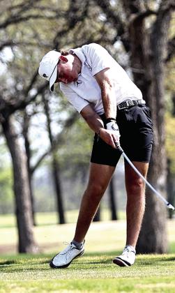 North Rock Creek's Carson Click connects with the ball on his tee shot. Photo courtesy of Gowin Photography