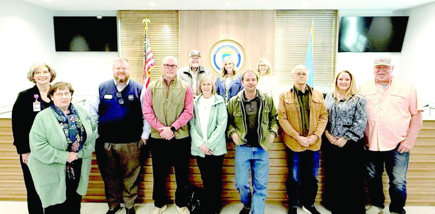 School Board members and superintendents from Shawnee, Gordon Cooper and Wanette, who were in attendance, pose with the County Commissioners who declared January School Board Recognition Month at the Commission meeting on Jan. 20. Julie Talton, Countywide &amp; Sun