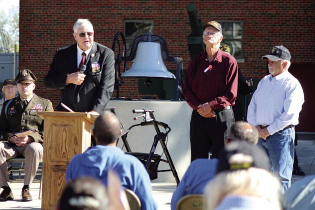 At the Woodland Veterans Memorial Park on Nov. 11, Reuben Rivers Chapter President Doug Warden speaks about the first two veterans to be inducted into Shawnee’s Hall of Honor at the new Pottawatomie County Veterans Museum. They are Sgt. Gary Opela and Lt. Col. Joe “Nokey” Klutts. Reuben Rivers is a new chapter with the Oklahoma Military Hall of Fame.