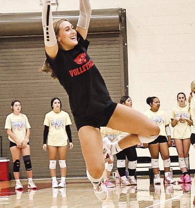 NRC senior Lily Dyer celebrates after a kill in the three-way volleyball scrimmage with Tecumseh and Shawnee on Aug. 3. Photos Courtesy of Gowin Photography