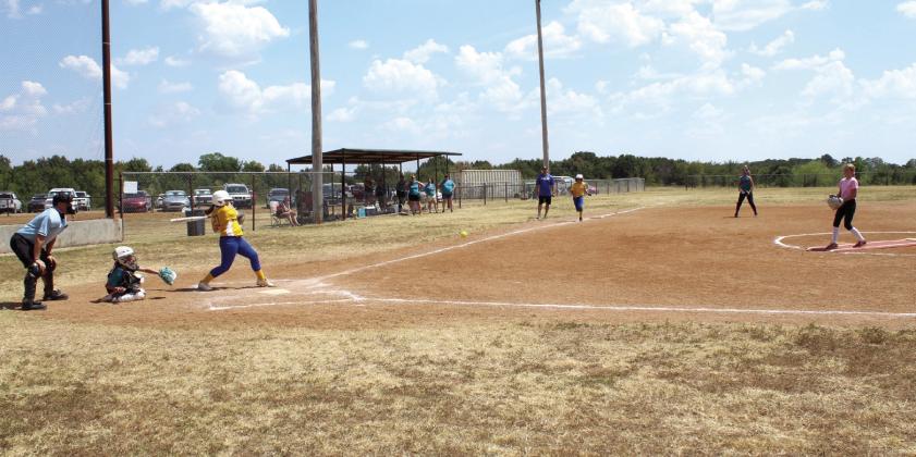 Teams from Holdenville and Ada play in a 12-and-under softball tournament at the Asher Sports Complex, located at 38083 Old Highway 18, on Aug. 29. Five area teams, including the Oklahoma Dust from Asher, coached by Maud Alum Raeyleigh Gensman, played in the tournament. Natasha Dunagan, Countywide &amp;amp; Sun