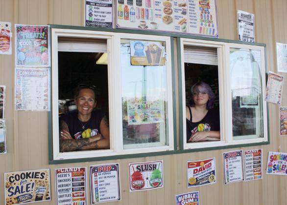 Michelle Watson and Nadaleigh Gensman man the concession booth.
