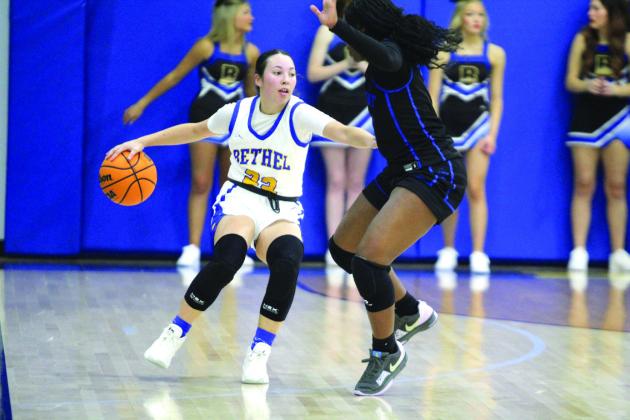 Bethel junior Ava Gascon guards the ball as she makes her way up court during the Jan. 7 home game against Mount St. Mary. The Lady Wildcats won, 58-41, and the Wildcats lost, 39-68, later that night.