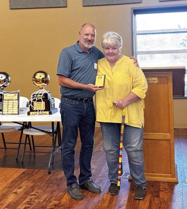 Troy Flewallen, 1986 Dale graduate, presented Donna Hampton 1966 graduate, with one of the first Pirate Pride awards during the banquet held Saturday, June 22. Countywide &amp;amp; Sun/Suzie Campbell