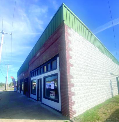 The most westward stop on the Empty Buildings Tour was the former Greens Corner, now remodeled and ready for new business. One of the two available rentals in this location was leased during the tour.