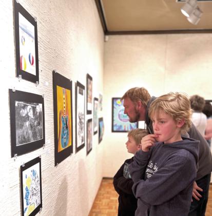 Gerrer Museum of Art. The annual exhibition will be on display from Mar. 1-30 and the opening reception will be on Mar. 2 at 5 pm. Photo provided by MGMoA Visitors tour the Annual High School Juried Art Exhibition at the Mabee-