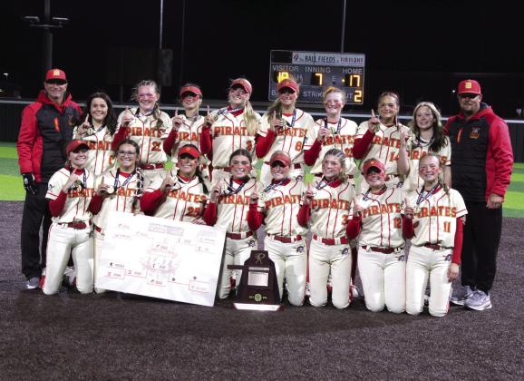 The Dale Lady Pirates and their coaches, Andy Powell, far left, and Bryce Clemmons, pose after winning the Class 4A State Slow Pitch State Championship at FireLake Ball Fields on May 5. The Lady Pirates narrowly beat Silo, 18-17, as well as Coalgate, 14-5, and Howe, 15-0. They end their season with a record of 39-4. Photos by Natasha Dunagan, Countywide &amp;amp; Sun