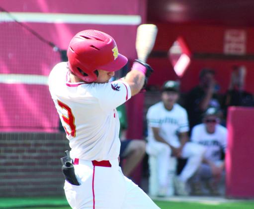 Dale junior Cruz Garrett hits a single in the second inning.