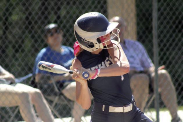 Asher sophomore Mackenzie Thompson prepares to hit a triple. The Lady Indians played two games with Achille and won both, 8-0. Natasha Dunagan, Countywide &amp; Sun