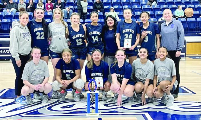 The Shawnee Lady Wolves, Head Coach Wendi Wells, far right, and managers pose after placing third in the tournament. Photo provided by Cherity Pennington