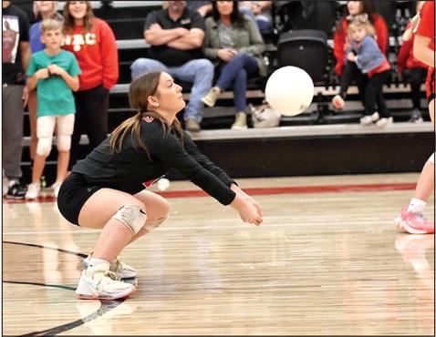 North Rock Creek’s Olivia Terrell positioned for a dig.