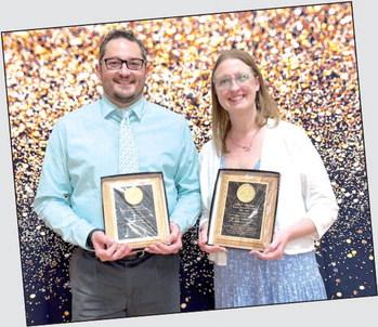 Tecumseh High School teachers David Shaw ( left) and Renee Wootten pose with their President’s Award and Lola C. Durham Award, respectively.